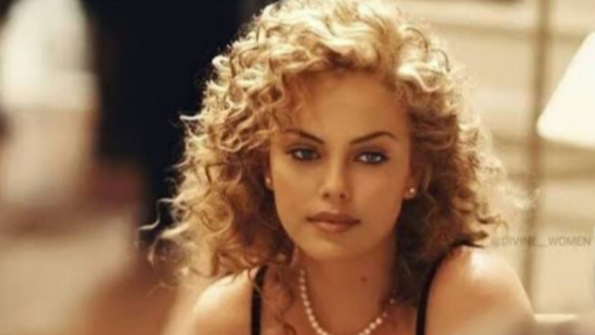 Charlize Theron in The Devil's Advocate (1997)