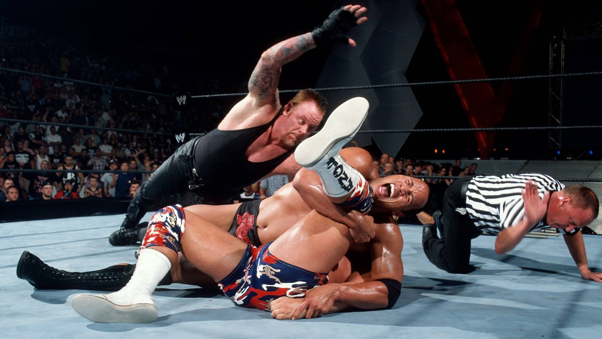 4- The Rock vs. Kurt Angle vs. The Undertaker (Vengeance 2002)