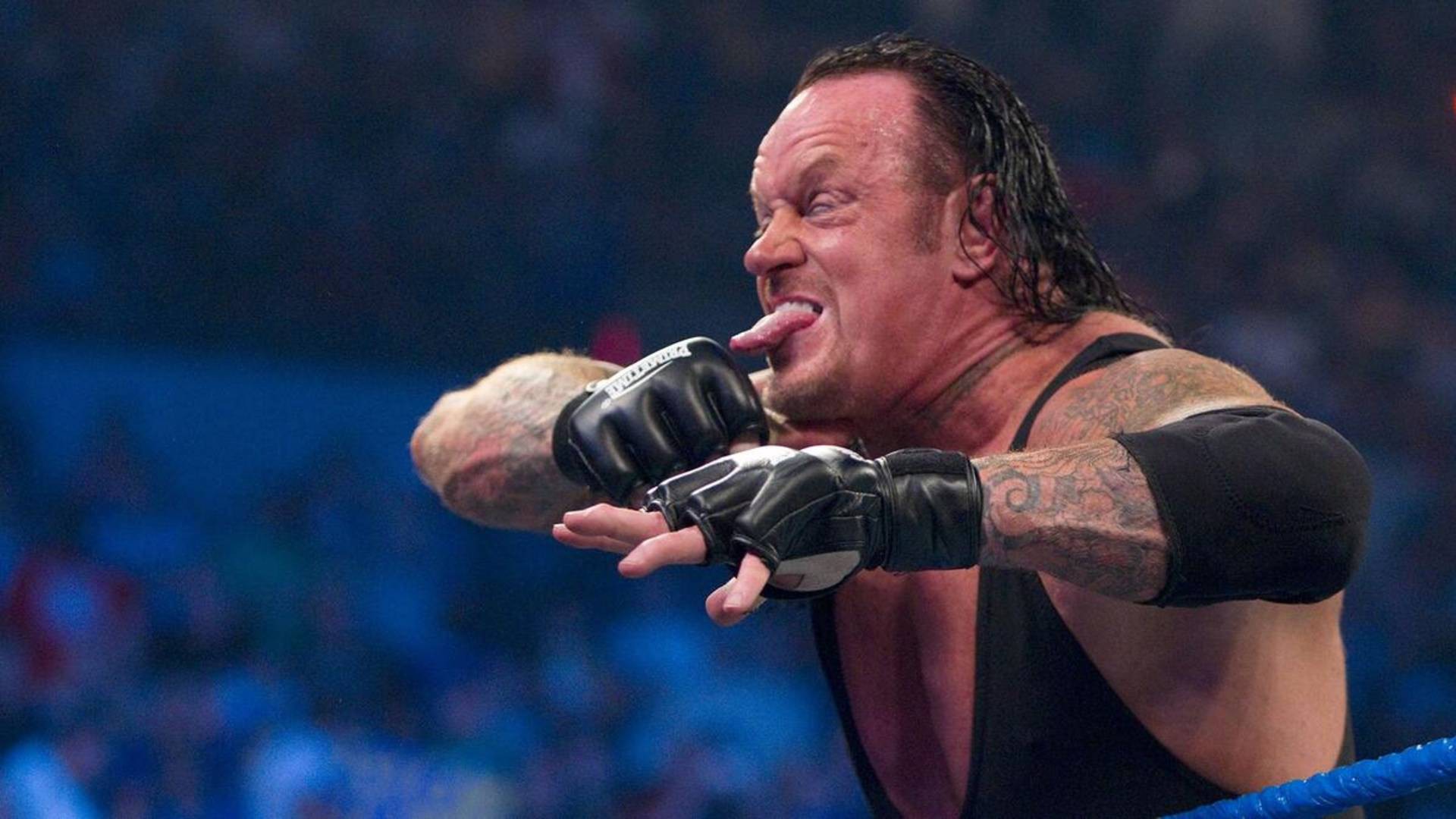 4- The Undertaker's Neck-Slice Taunt