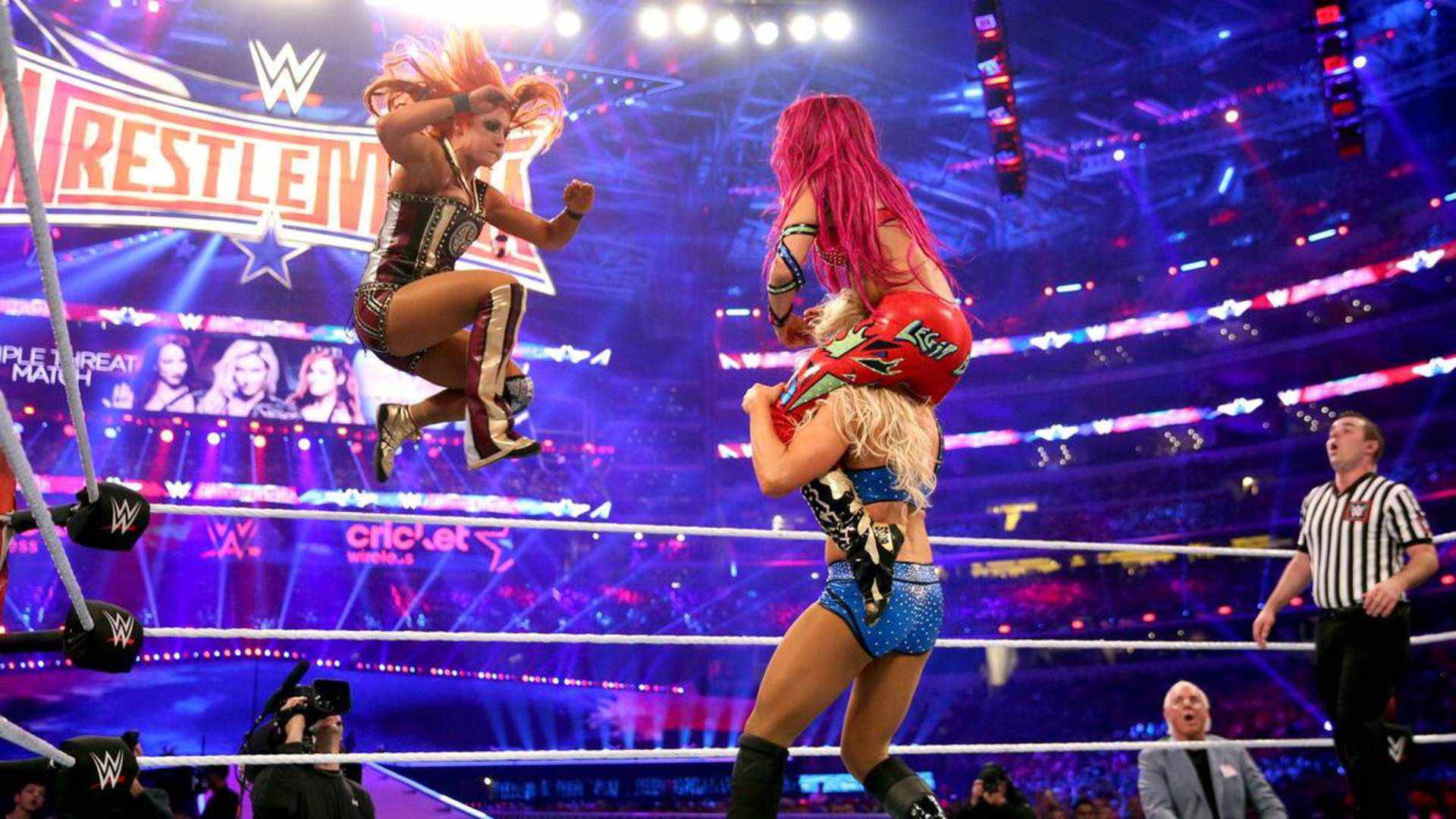 2- Charlotte Flair, Becky Lynch, & Sasha Banks at WrestleMania 32