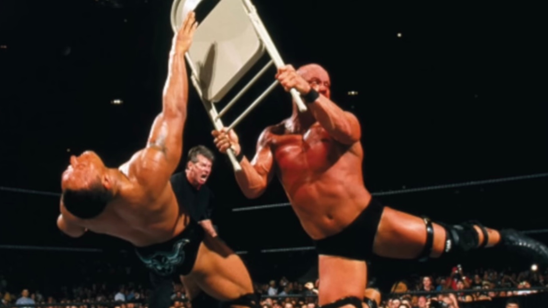 4.⁠ ⁠The Rock Refuses to Stay Down Against Stone Cold Steve Austin