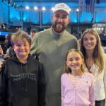 Travis Kelce and Kai Trump