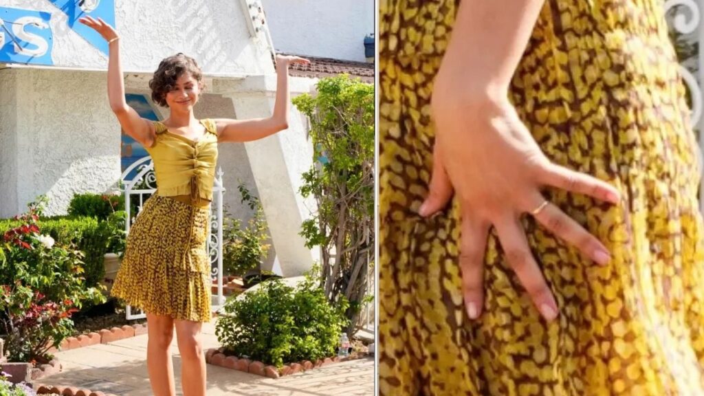 Zendaya wearing the gold ring during her wedding appearance