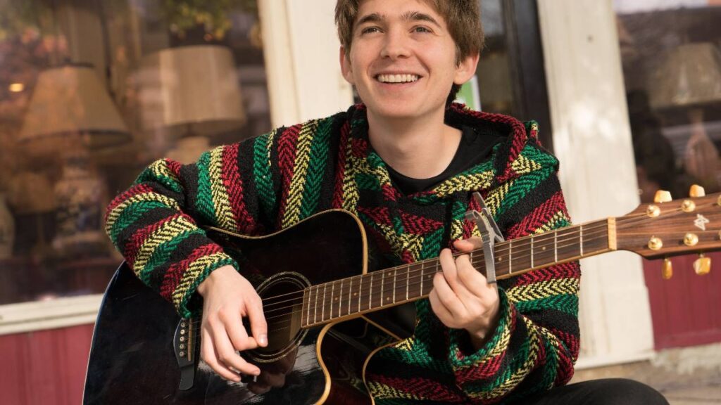 Austin Abrams as Troy Sloan