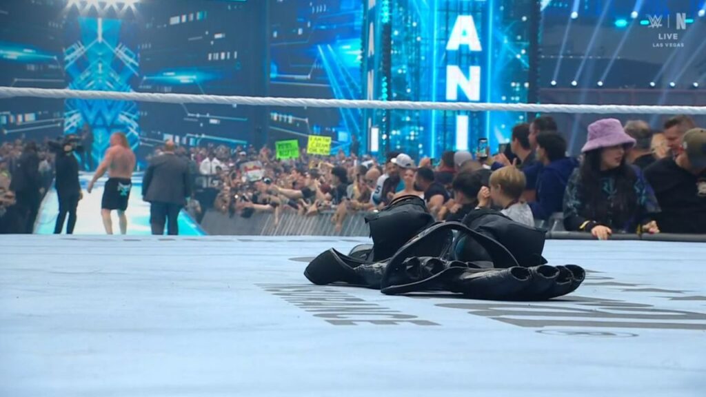 Brock Lesnar left his gloves and boots in the ring