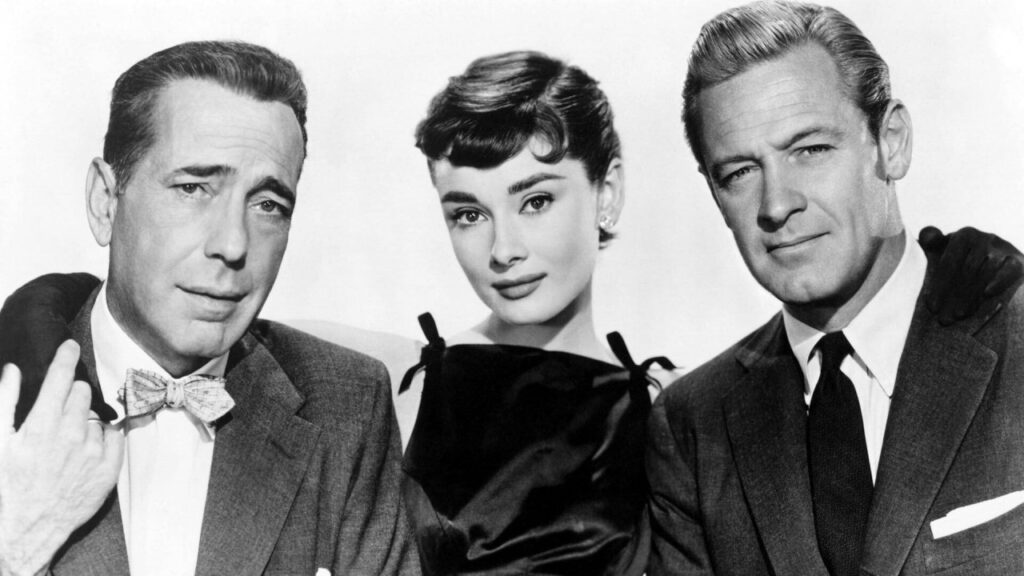 Humphrey Bogart, William Holden and Audrey Hepburn in 'Sabrina' (Image: Paramount Pictures)