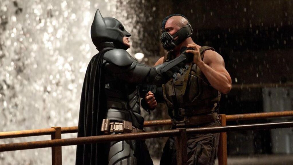Christian Bale as Batman and Tom Hardy as Bane in 'The Dark Knight Rises' (Image: Warner Bros.)