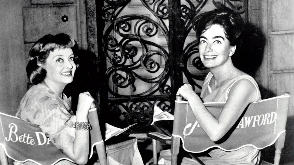 Bette Davis and Joan Crawford on the set of 'What Ever Happened to Baby Jane?' (Image: Warner Bros.)