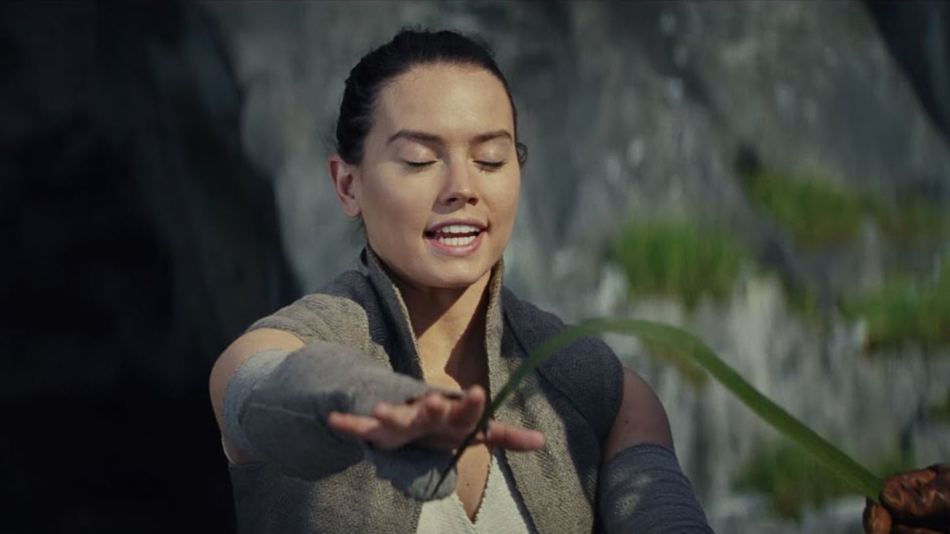 6. Luke Tickling Rey with a Leaf (The Last Jedi)