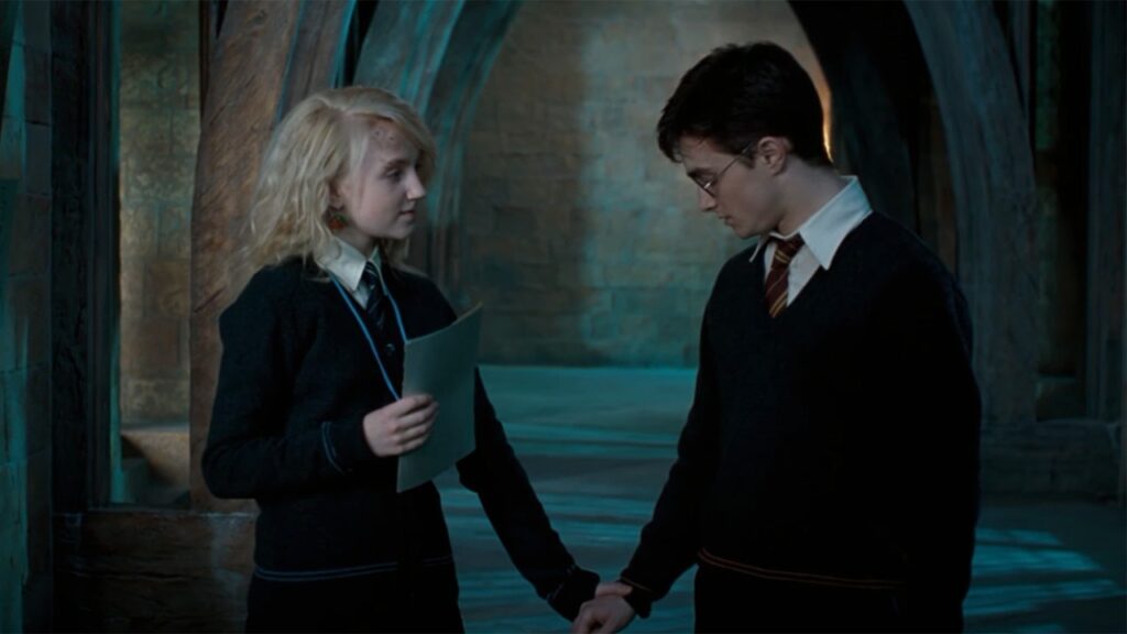 Daniel Radcliffe as Harry Potter and Evanna Lynch as Luna Lovegood (Image: Warner Bros.)
