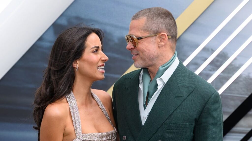 Ines de Ramon and Brad Pitt