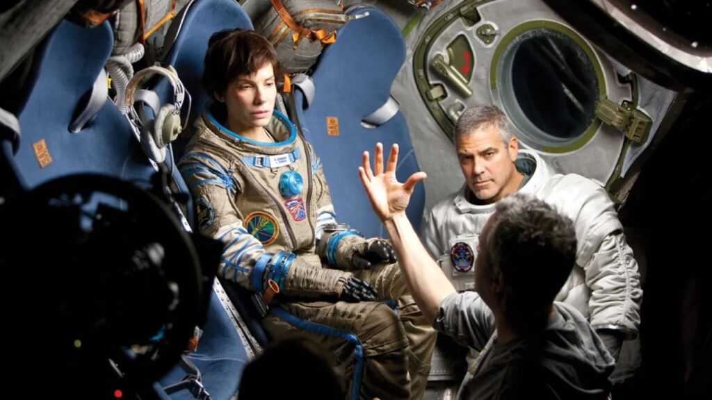 The behind-the-scenes filming of 'Gravity' with Sandra Bullock and George Clooney (Image: Warner Bros.)