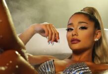 Ariana Grande Opens Up About Her Risky Bath-Time Ritual That Even Left Amy Poehler Stunned Ariana Grande (Image: Bustle)