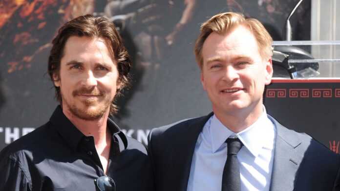 Christian Bale and Christopher Nolan (Image: SYFY) Christian Bale and Christopher Nolan (Image: SYFY)