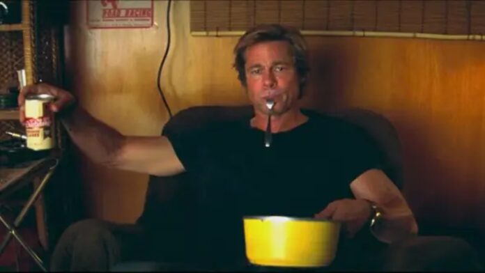 Brad Pitt eating in 'Once Upon a Time in Hollywood (Image: Columbia Pictures)