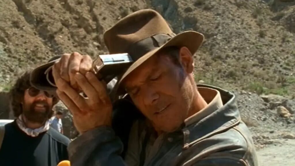 Harrison Ford stapling his fedora (Image: Paramount Pictures)