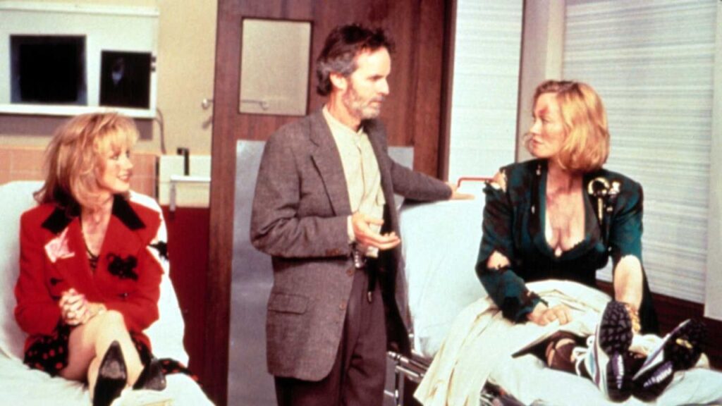Cybill Shepherd and Morgan Fairchild alongside actor David Clennon